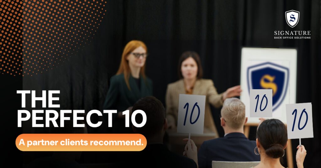 Audience holding perfect 10 score cards at a Signature Back Office Solutions presentation on NPS performance.